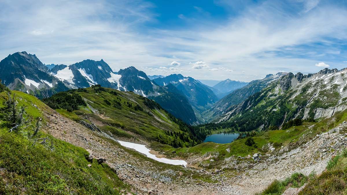 nature mountain near body of water during daytime mountain